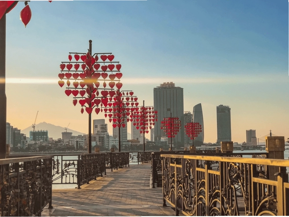 A romantic view of Dragon Bridge from Love Bridge