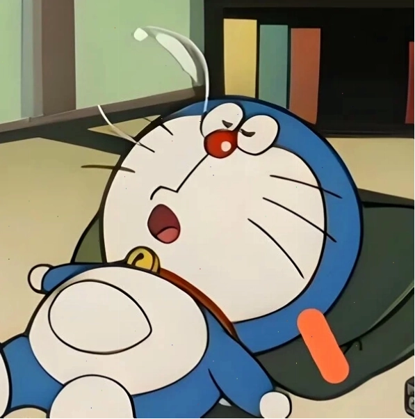Meme Doraemon ngủ gật thể hiện sự mệt mỏi